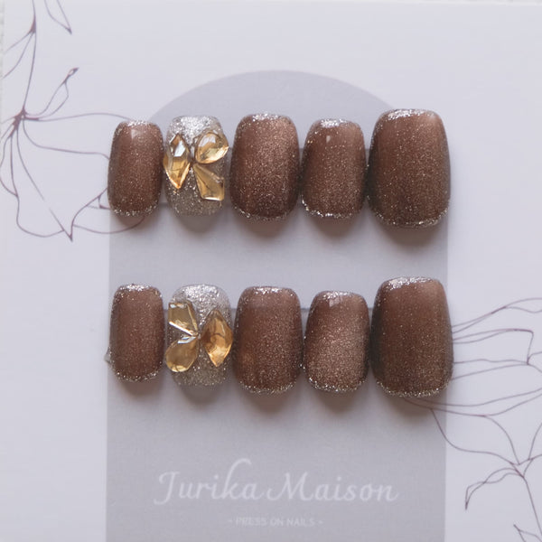 Jurika Maison glitter brown cat eye press on nails