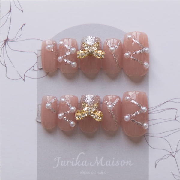 Jurika Maison nude pearl press on nails